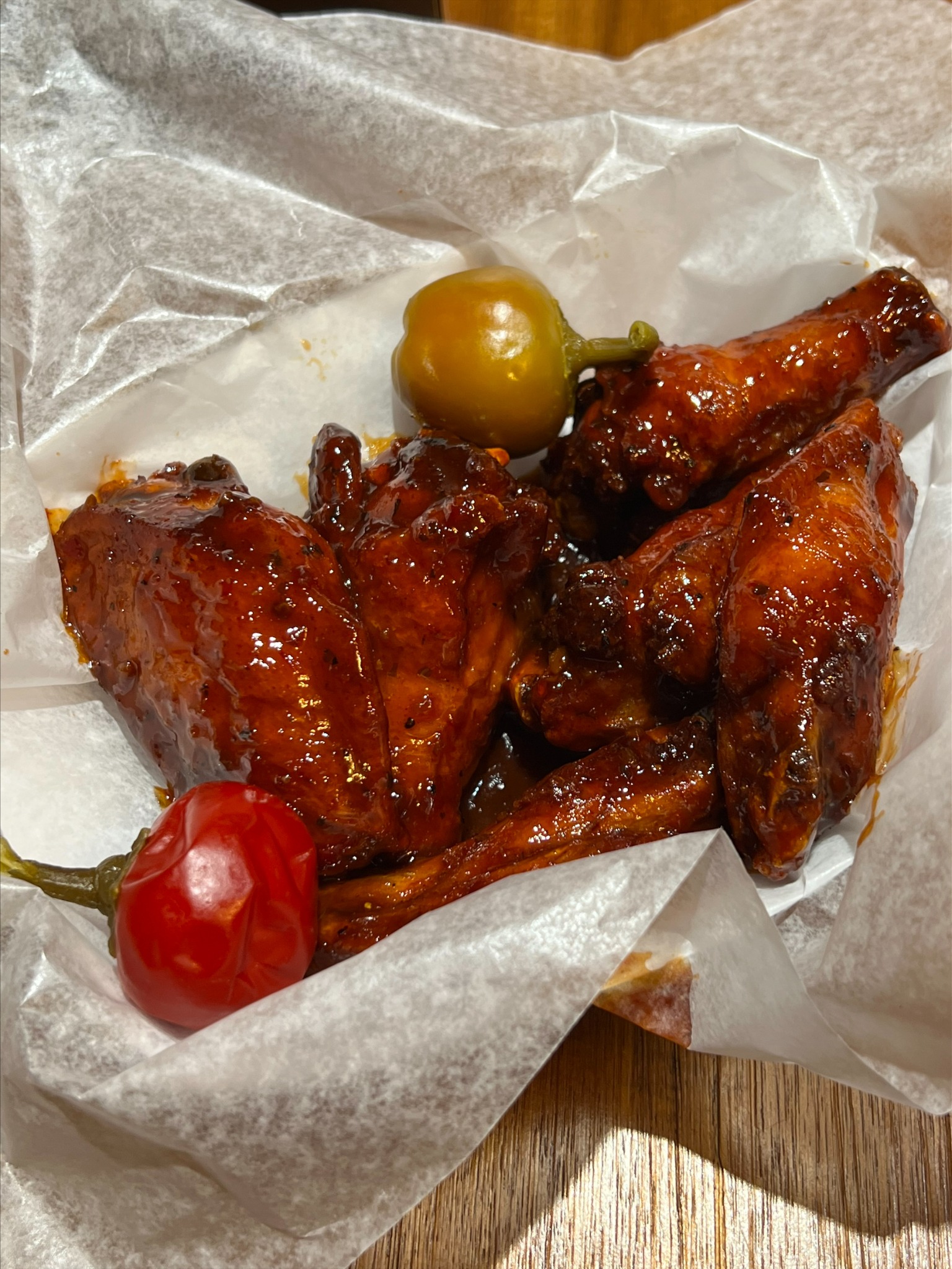 Saucy wings served at The Den